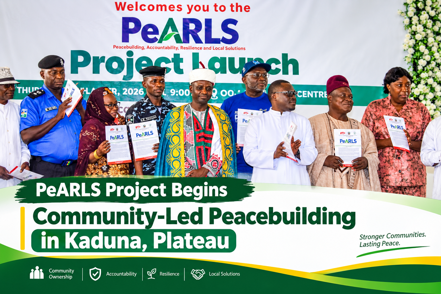 PeARLS Project launch stakeholders holding project materials at the community-led peacebuilding event in Jos, Plateau State.